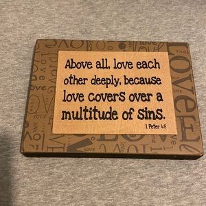 Wooden sign. New. Love covers sins.